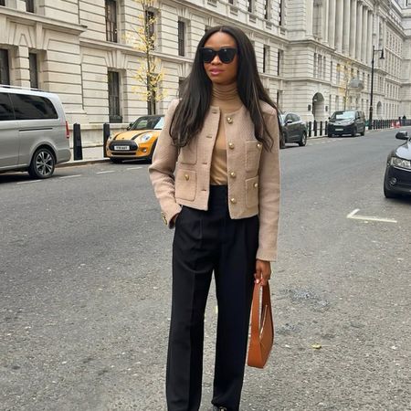 fashion influencer @symphonyofsilk wearing the cropped jacket trend