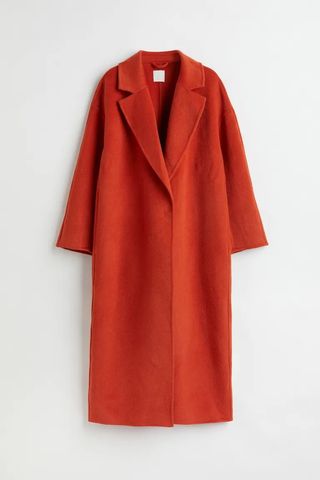 rihanna orange coat 
