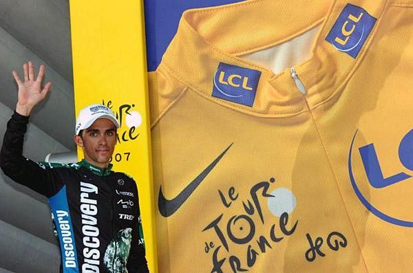 Contador steps up to the leader's podium