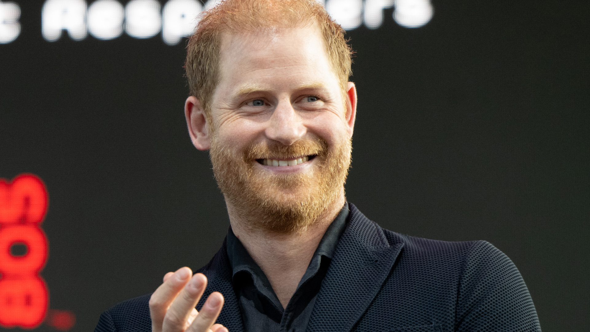 Prince Harry wearing a black shirt and suit jacket at the One805LIVE! 2025 concert benefiting first responders on September 20, 2025