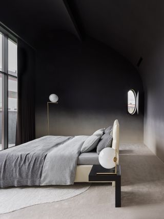 A dark bedroom lit up with natural light