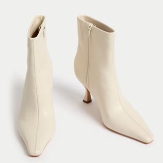 white heeled ankle boots