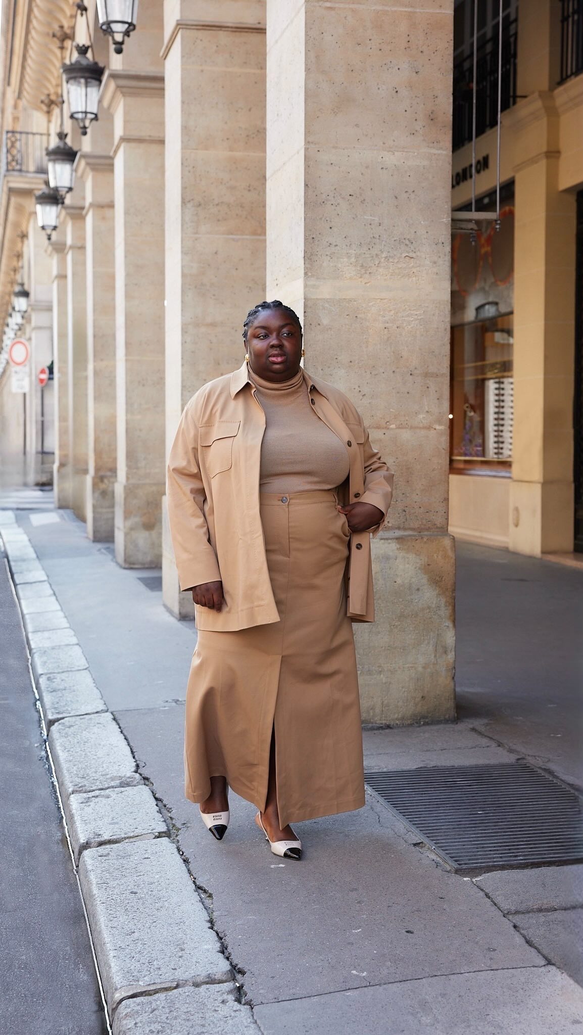 Abi Marvel wearing an all-camel monochrome outfit.
