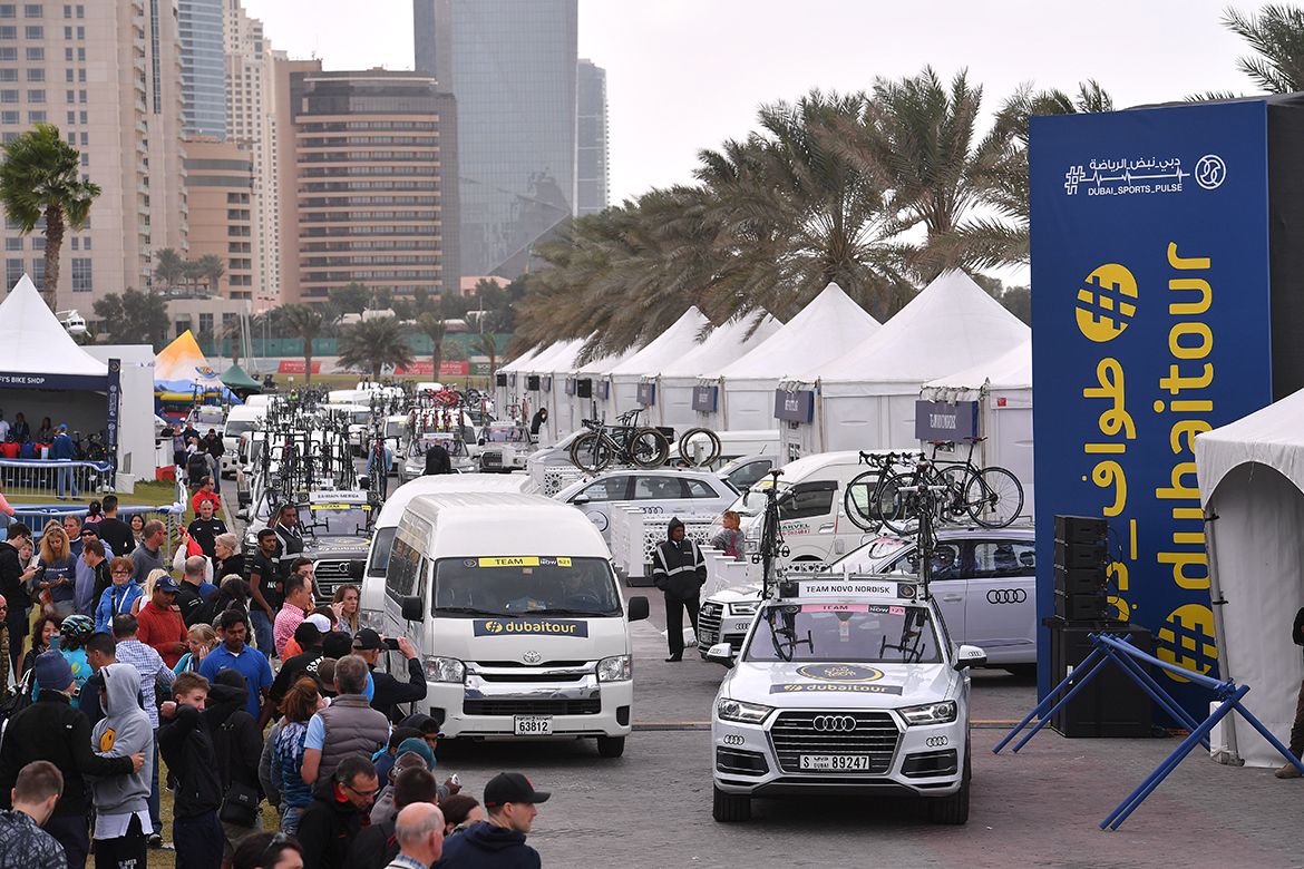 The race convoy heads out to the start