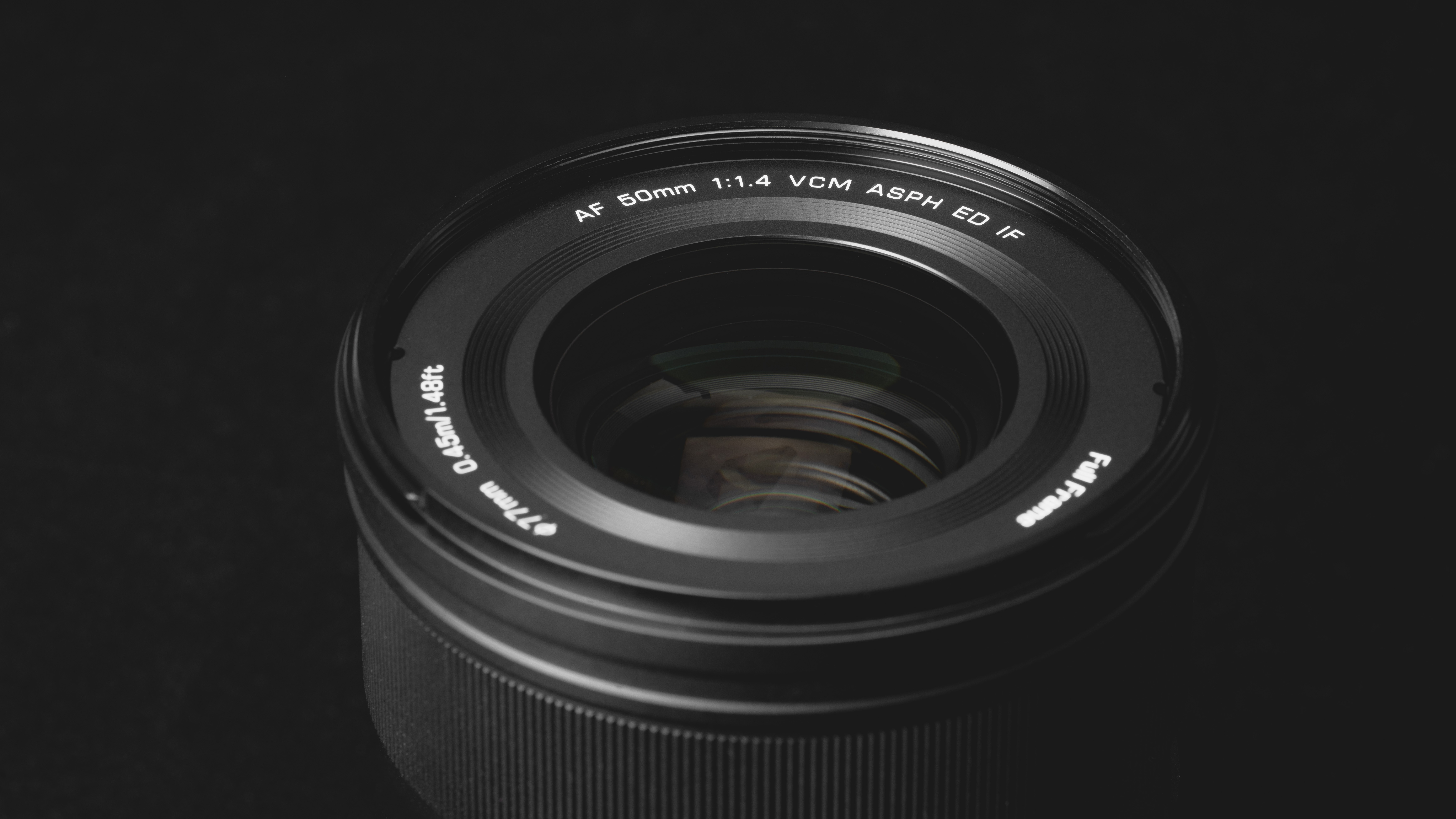 Viltrox AF 50mm f/1.4 Pro lens on a black background