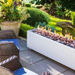 garden with chairs and fire pit