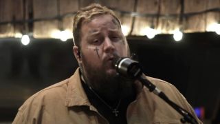 Jelly Roll sings "Save Me" in a new unreleased video on his YouTube channel.