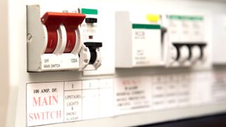 Close up of Dual RCD Consumer unit with a focus on the red main switch