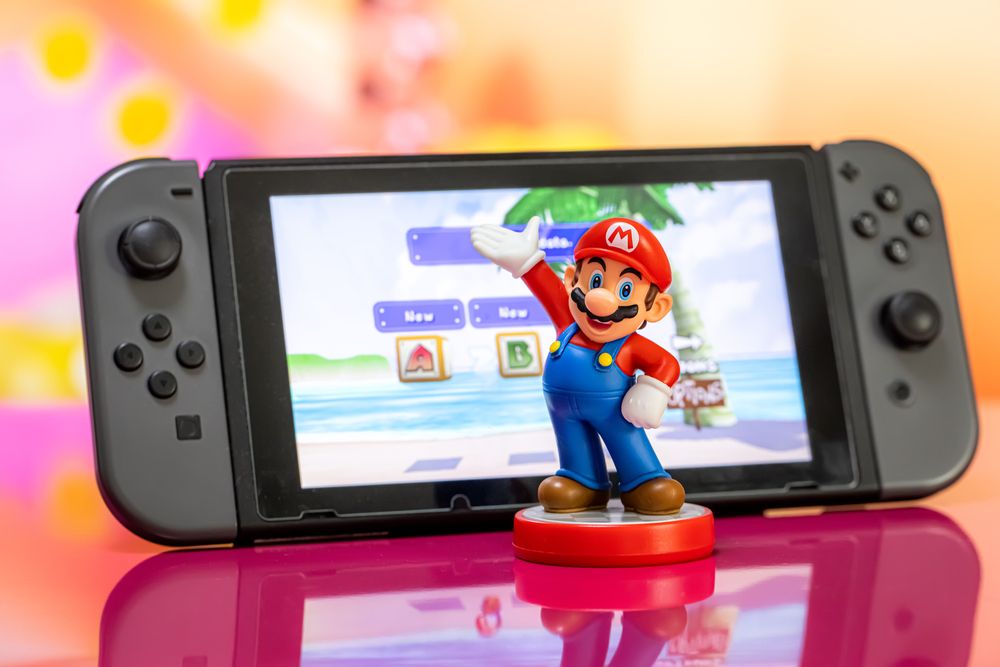 Stock image of Mario and a Nintendo Switch