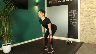 Personal trainer Alanah Bray performs Romanian deadlift