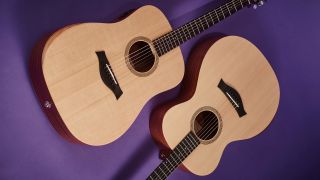 Two Taylor beginner acoustic guitars lying on a purple floor