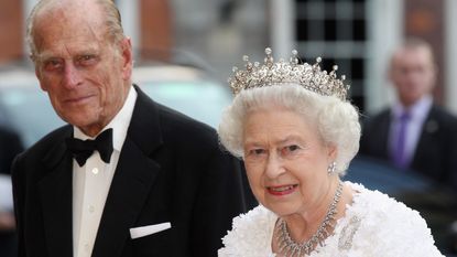 Queen Elizabeth II and Prince Philip, Duke of Edinburgh arrive to attend a State Banquet in Dublin Castle