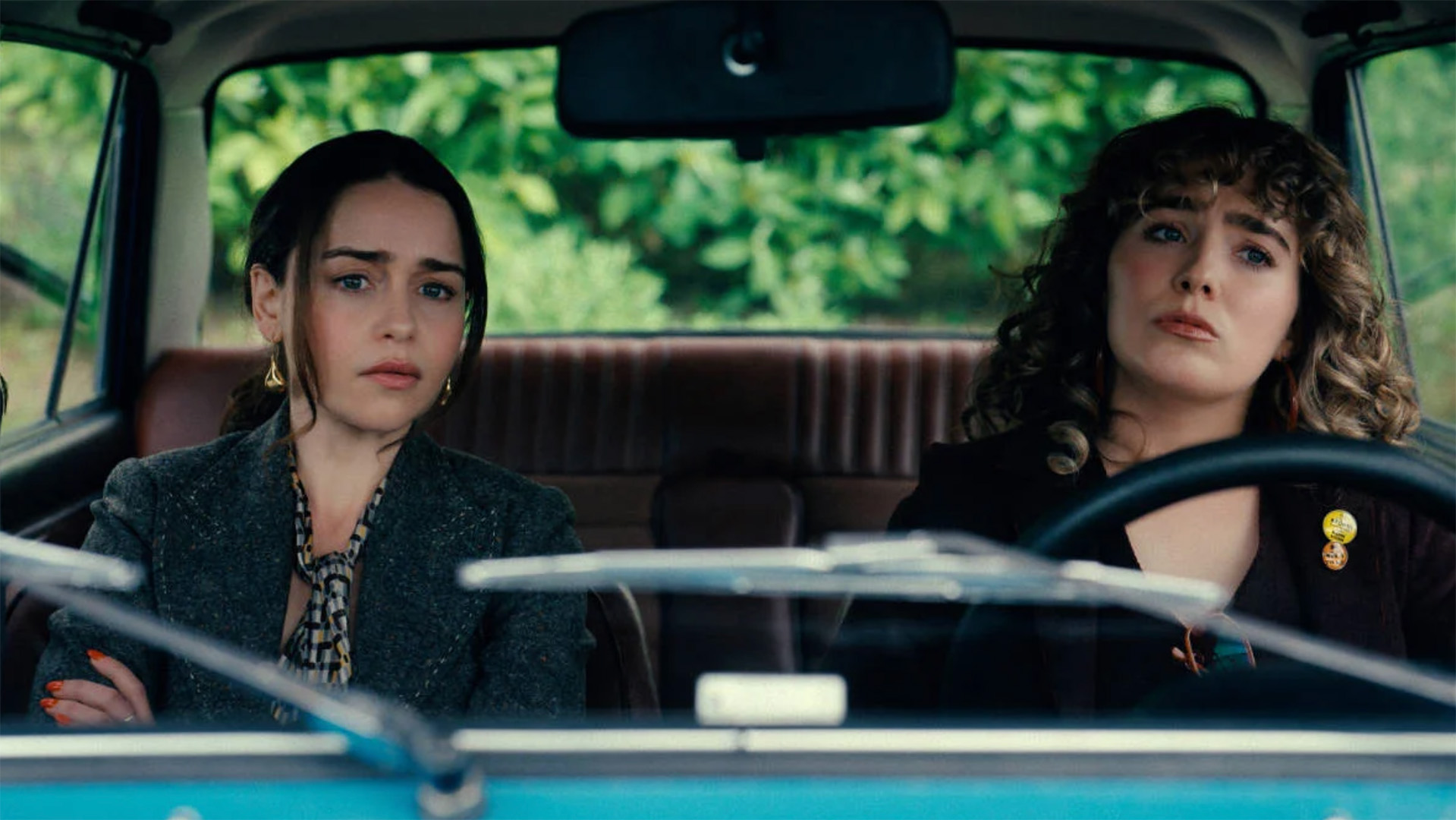 Emilia Clarke as Bea Grant and Haley Lu Richardson as Twila Hasbeck in Ponies.