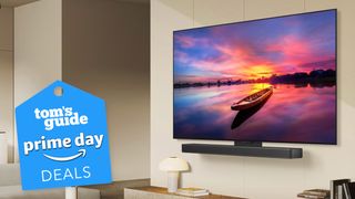 An LG C4 OLED TV displaying a boat and a sunset, mounted on a wall in a modern living room