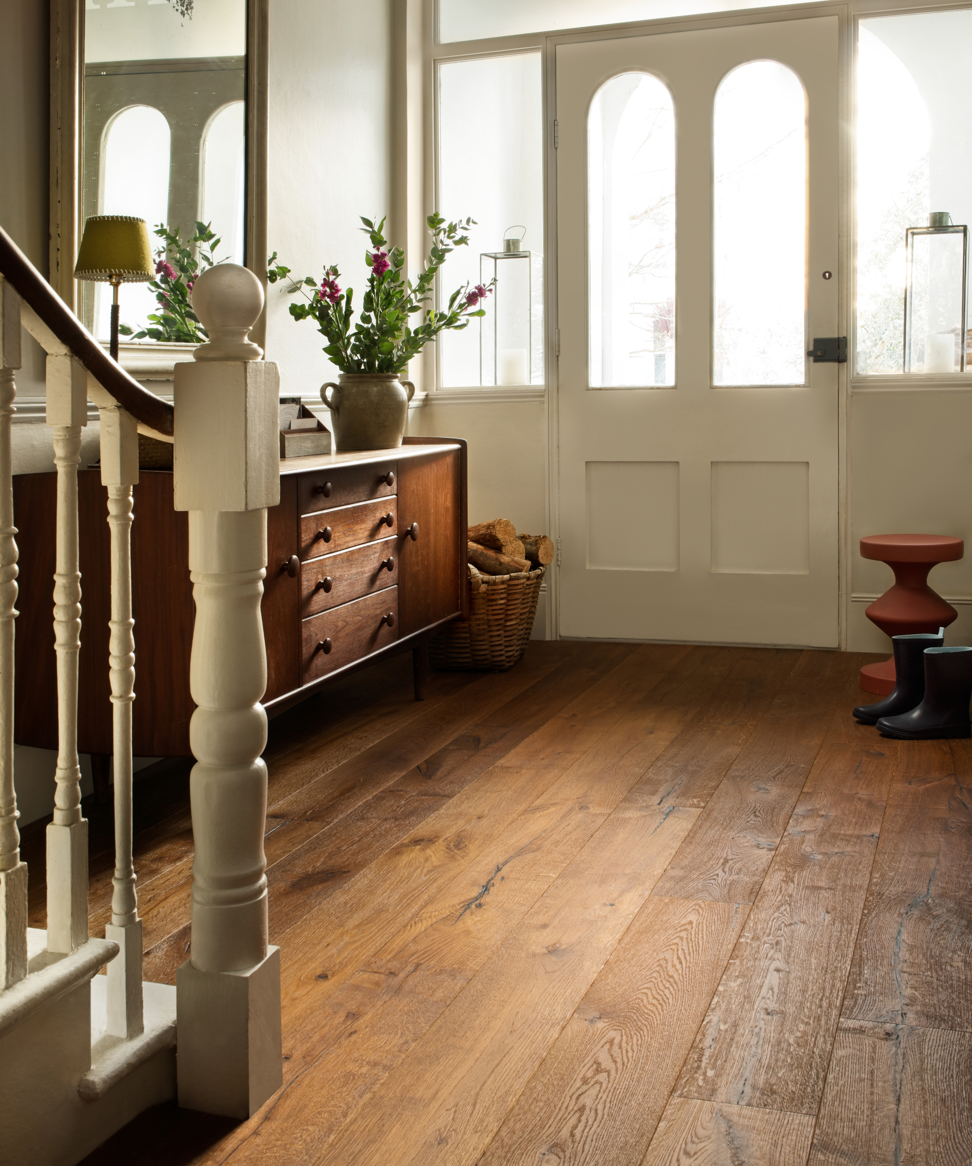 hallway in period house with wide plank wooden flooring