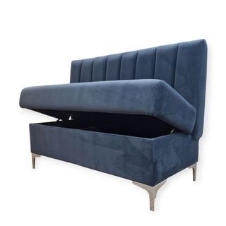 Blue velvet fluted seating on silver legs