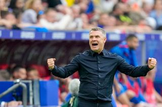 Ukraine Euro 2024 squad head coach Serhiy Rebrov of Ukraine celebrates after winning the UEFA EURO 2024 group stage match between Slovakia and Ukraine at Düsseldorf Arena on June 21, 2024 in Dusseldorf, Germany. (Photo by Alex Gottschalk/DeFodi Images via Getty Images)