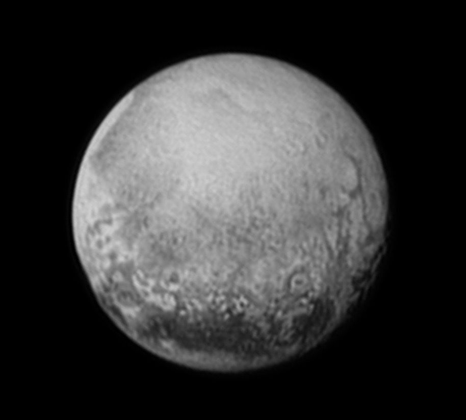 Image of Pluto captured by NASA&#039;s New Horizons spacecraft on July 11, 2015. The photo shows linear features that may be cliffs, as well as a large circular feature that could be an impact crater.