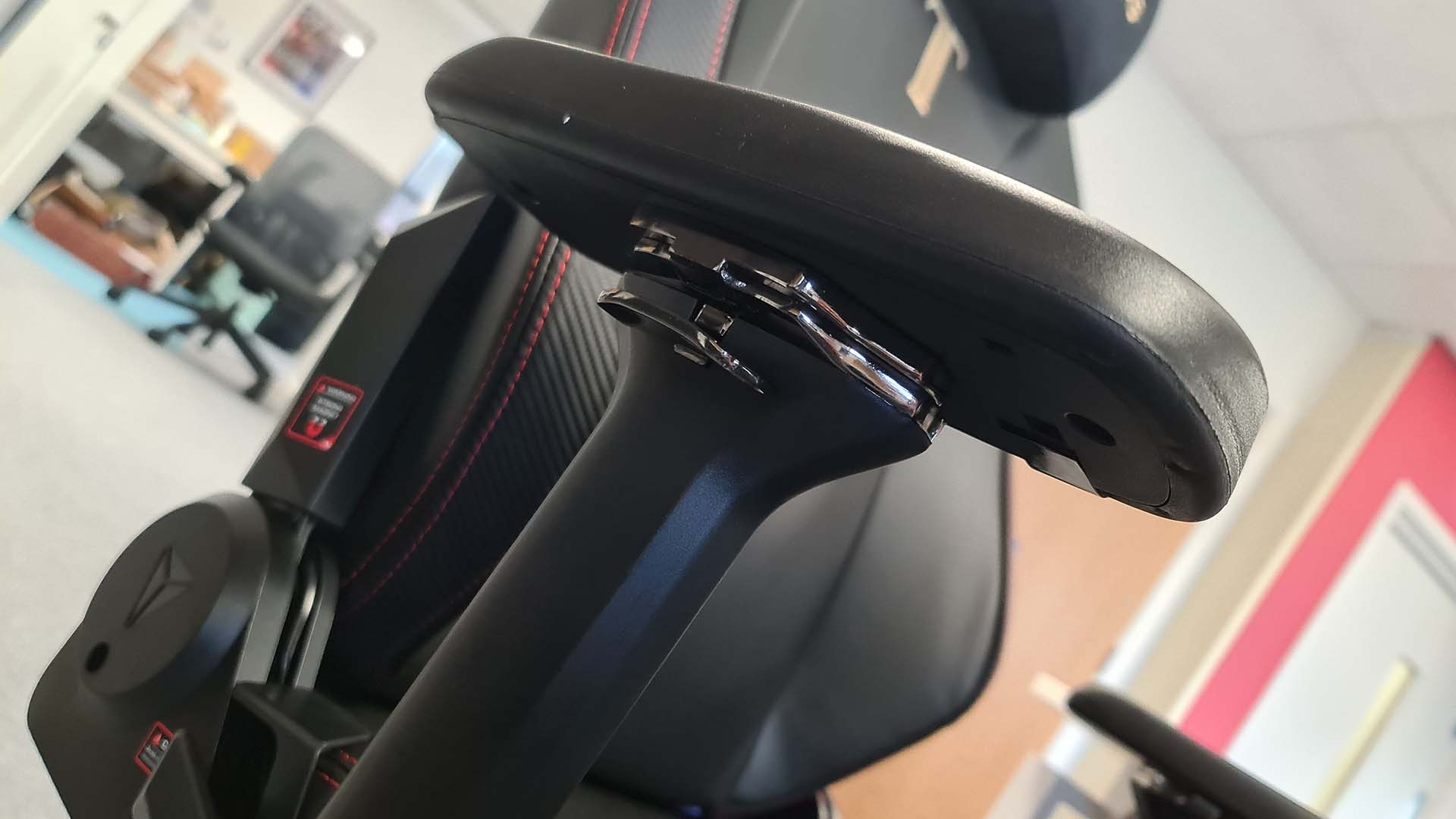 Image of the Secretlab Titan Evo 2022 gaming chair's metal armrest mechanism.