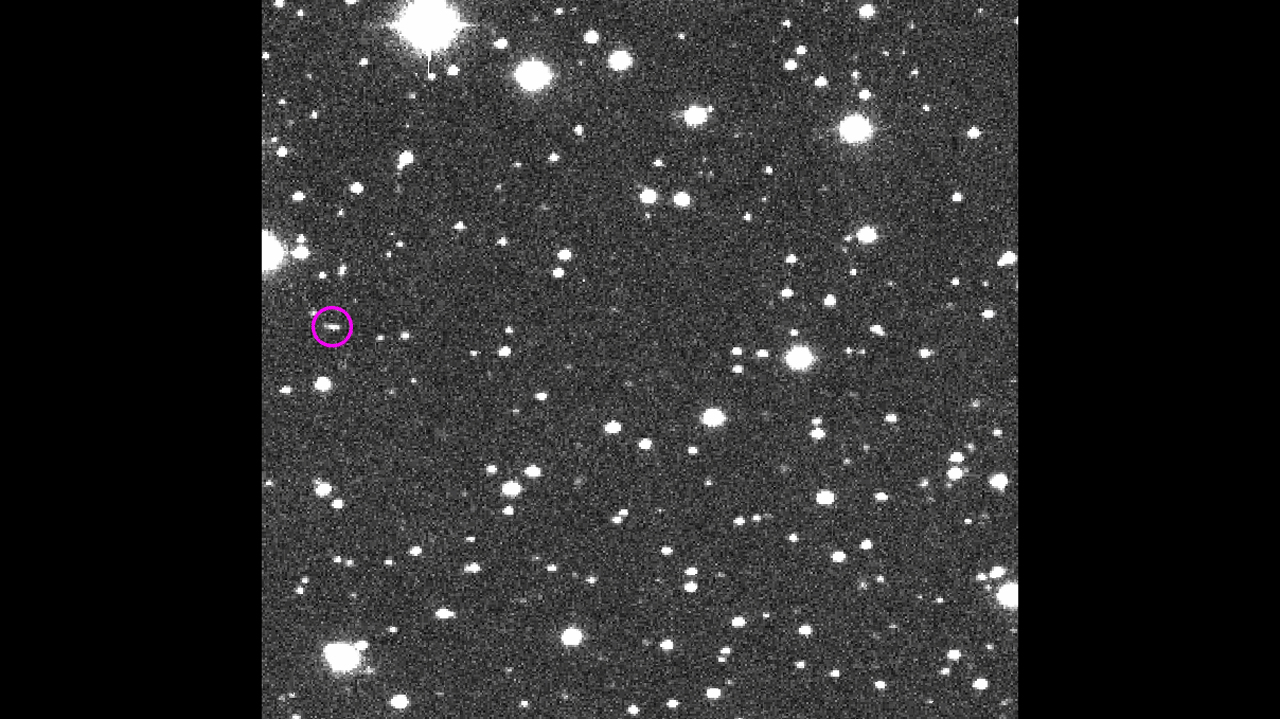 A small asteroid about as far away as the moon moves across a sequence of four images taken in one night by the Catalina Sky Survey in Arizona.