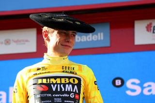 EIBAR SPAIN APRIL 08 Jonas Vingegaard of Denmark and Team Jumbo Visma celebrates at podium as Yellow Leader Jersey winner with Txapela hat trophy during the 62nd Itzulia Basque Country Stage 6 a 1378km stage from Eibar to Eibar UCIWT on April 08 2023 in Eibar Spain Photo by David RamosGetty Images