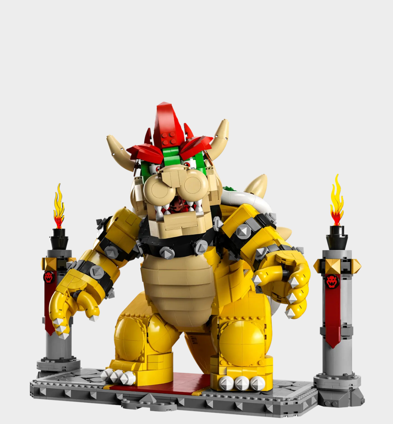 Lego The Mighty Bowser set on a stand against a plain background