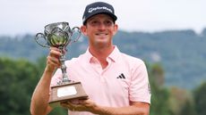 Jacob Bridgeman holding the Biltmore Championship trophy