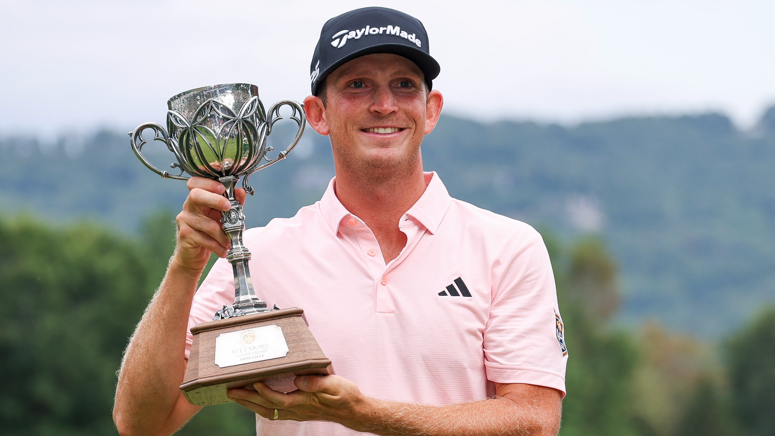 Jacob Bridgeman holding the Biltmore Championship trophy