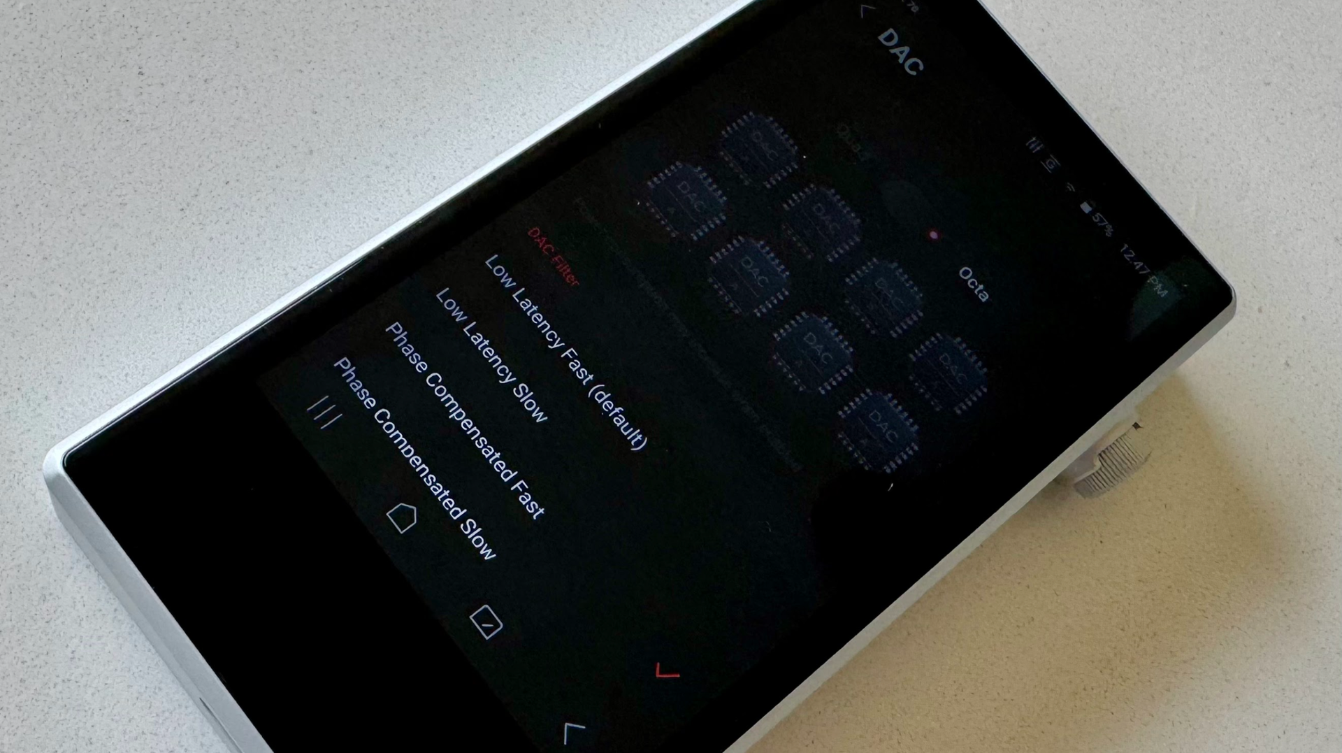 Astell & Kern's PD5 player on a gray table, showing details of the player