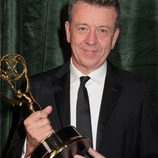Peter Morgan accepts the award for outstanding Writing For A Drama Series for The Crown attends the Netflix celebration of the 73rd Emmy Awards at 180 The Strand on September 19, 2021 in London, England.