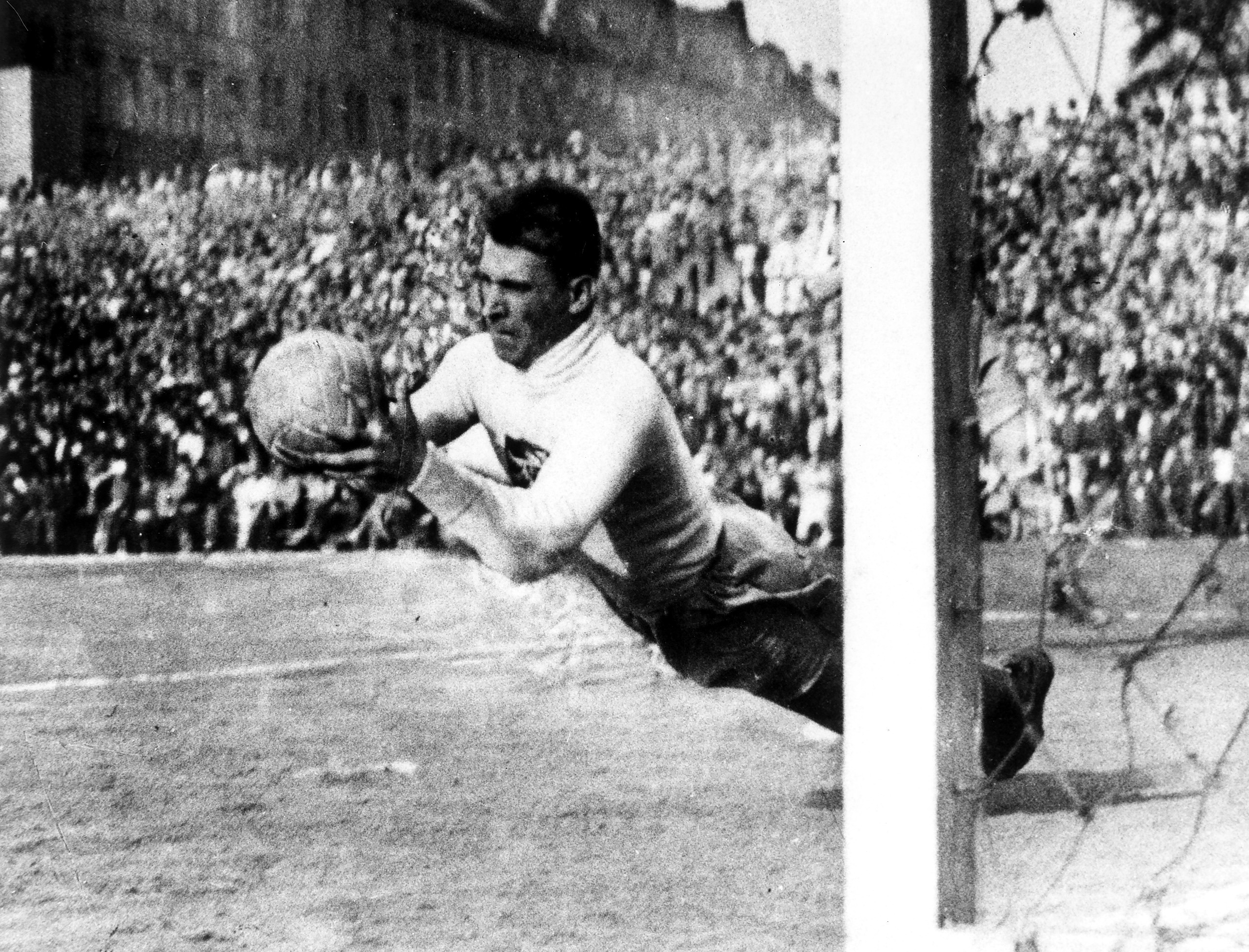 Czech goalkeeper František Plánička makes a save at the 1934 World Cup.