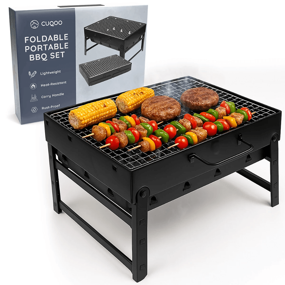 A CUQOO foldable portable BBQ set with corn, burgers and skewers on the grill