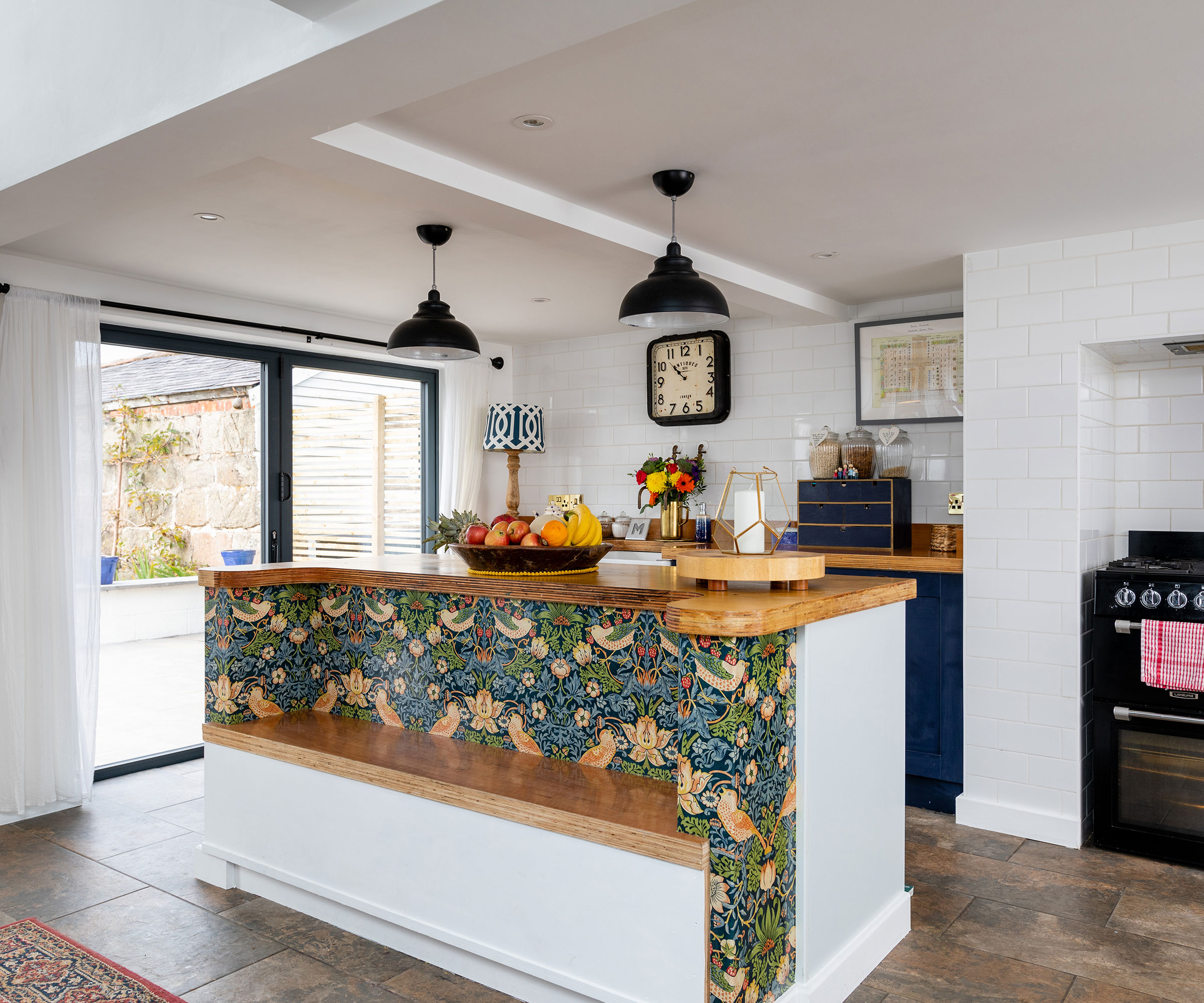 farmhouse-style kitchen with a wooden worktop