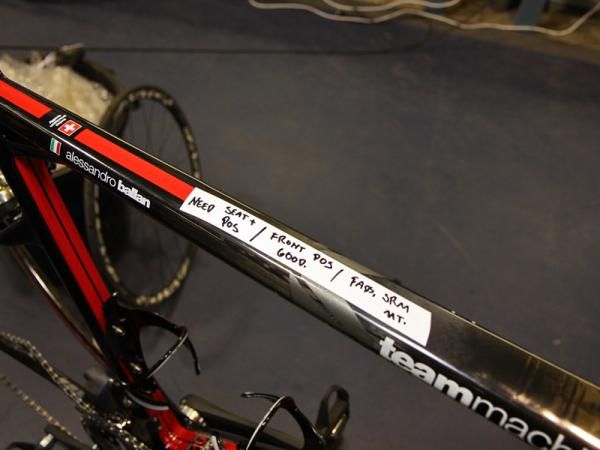 BMC team mechanics use both a "three-page spreadsheet" and a makeshift system of handwritten notes right on a rider's bike to denote when something needs to get done.