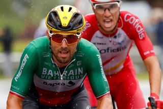 Team Bahrains Sonny Colbrelli of Italy L rides ahead of Team Cofidis Anthony Perez of France during the 9th stage of the 108th edition of the Tour de France cycling race 144 km between Cluses and Tignes on July 04 2021 Photo by Thomas SAMSON AFP Photo by THOMAS SAMSONAFP via Getty Images