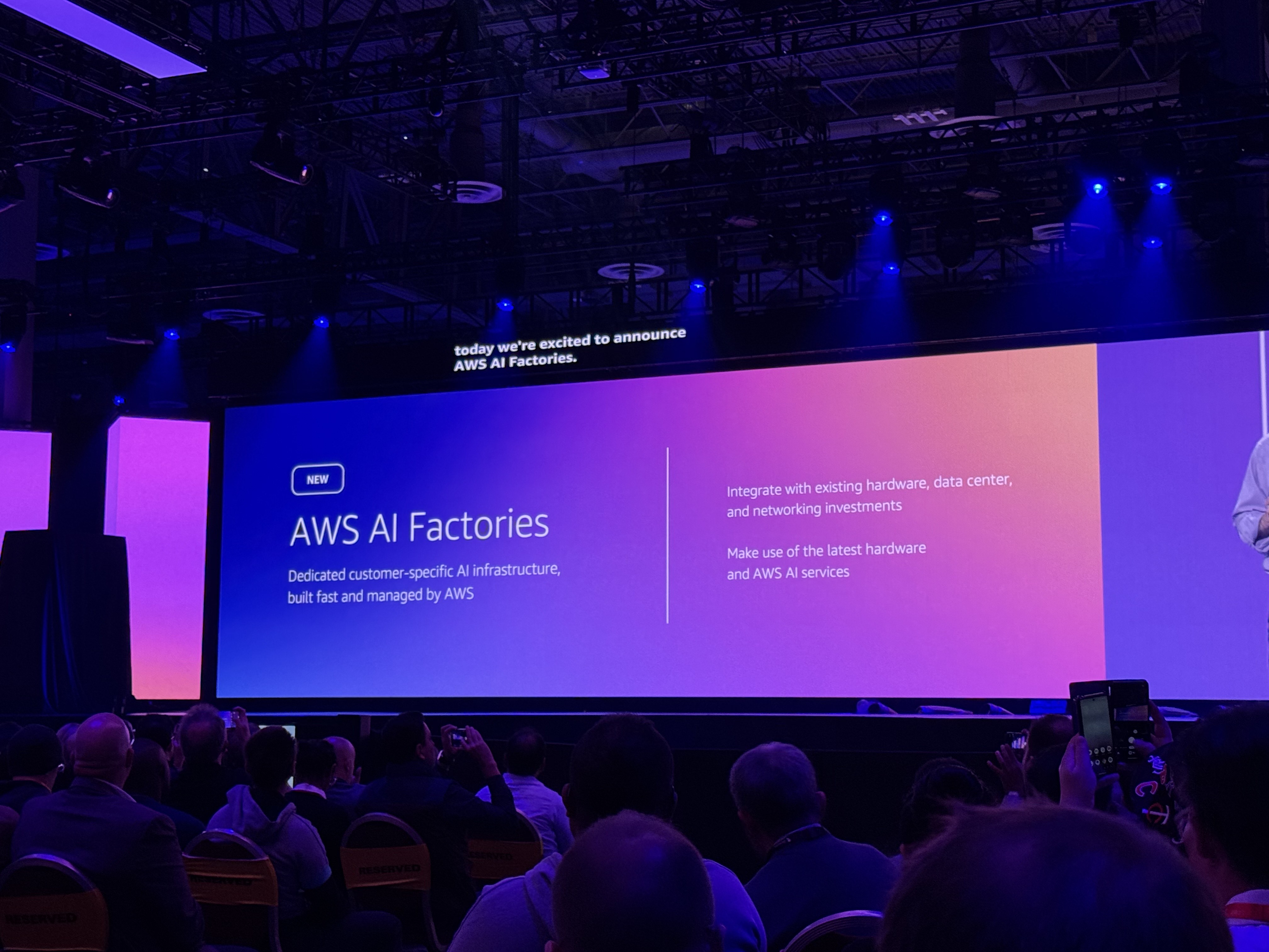 AWS AI Factories announcement slide pictured on stage during the opening keynote at AWS re:Invent 2025.