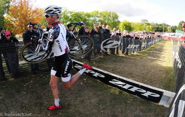 Mountain biker Lukas Fl&uuml;ckiger (Trek World Racing) leading the race on lap two over the barriers