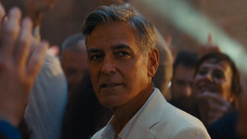 Jay (George Clooney) is surrounded by a crowd in Jay Kelly.