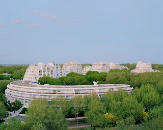 La Cité Oasis, a photographic series on La Grande Motte, shot by Charly Broyez & Laurent Kronental and showing sculptural, white and geometric modernist architecture in the south of france, surrounded by green spaces and in monumental scale