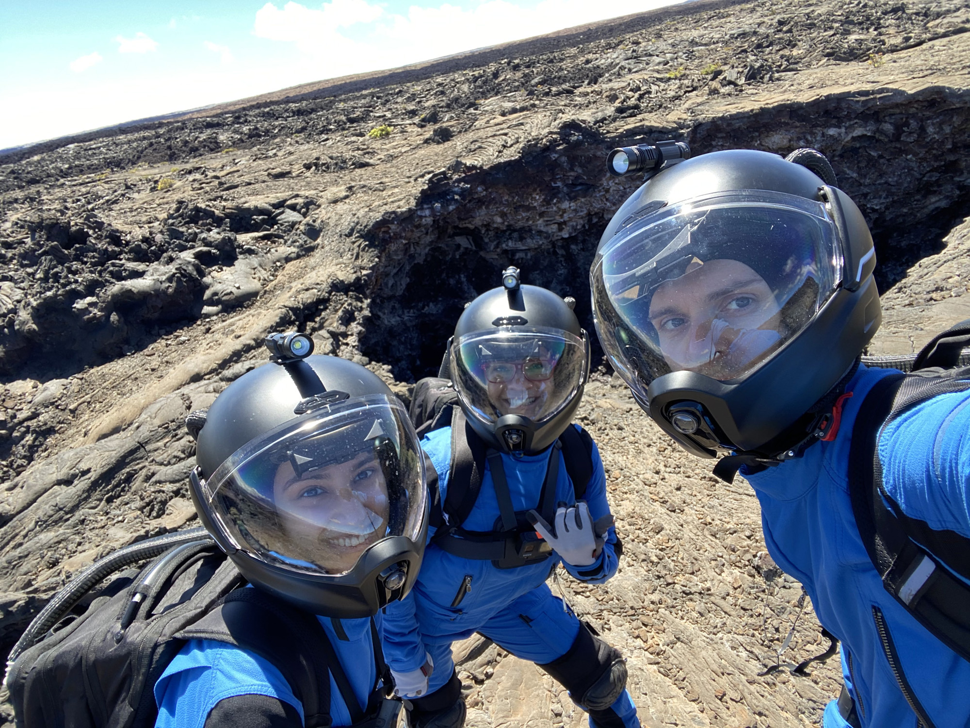 Officers Jhoti and Averesch with Commander Musilova at a lava tube skylight.