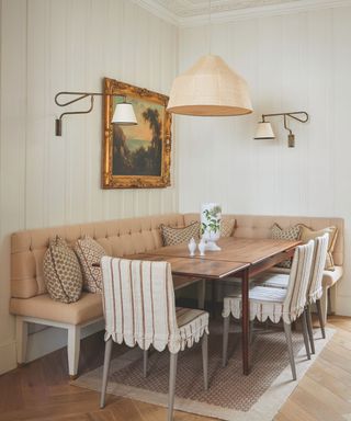 dining nook with inbuilt bench and patterned upholstered dining chairs