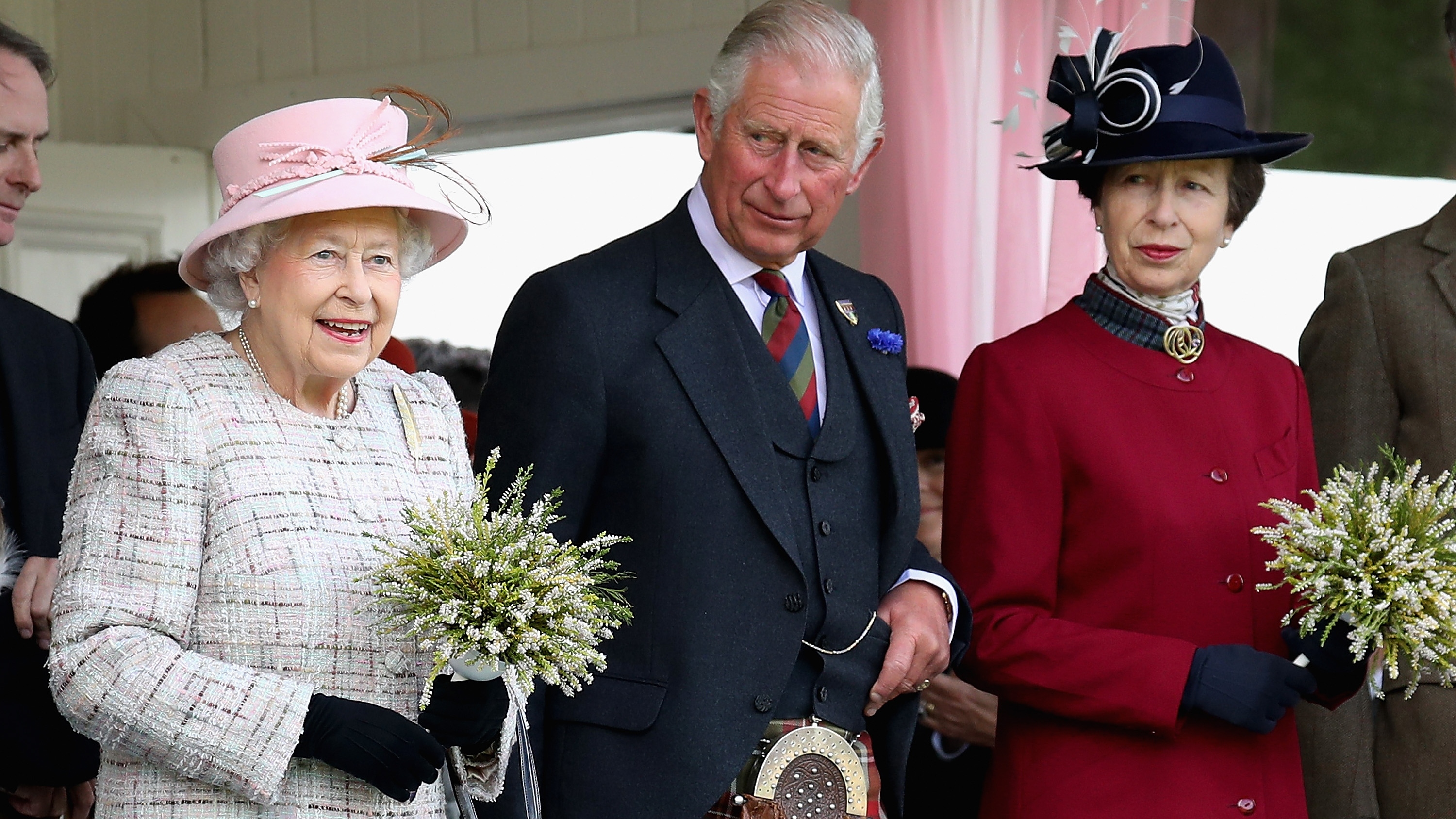 Queen Elizabeth II, Princess Anne and King Charles watch the 2017 Braemar Gathering at The Princess Royal and Duke of Fife Memorial Park on September 2, 2017