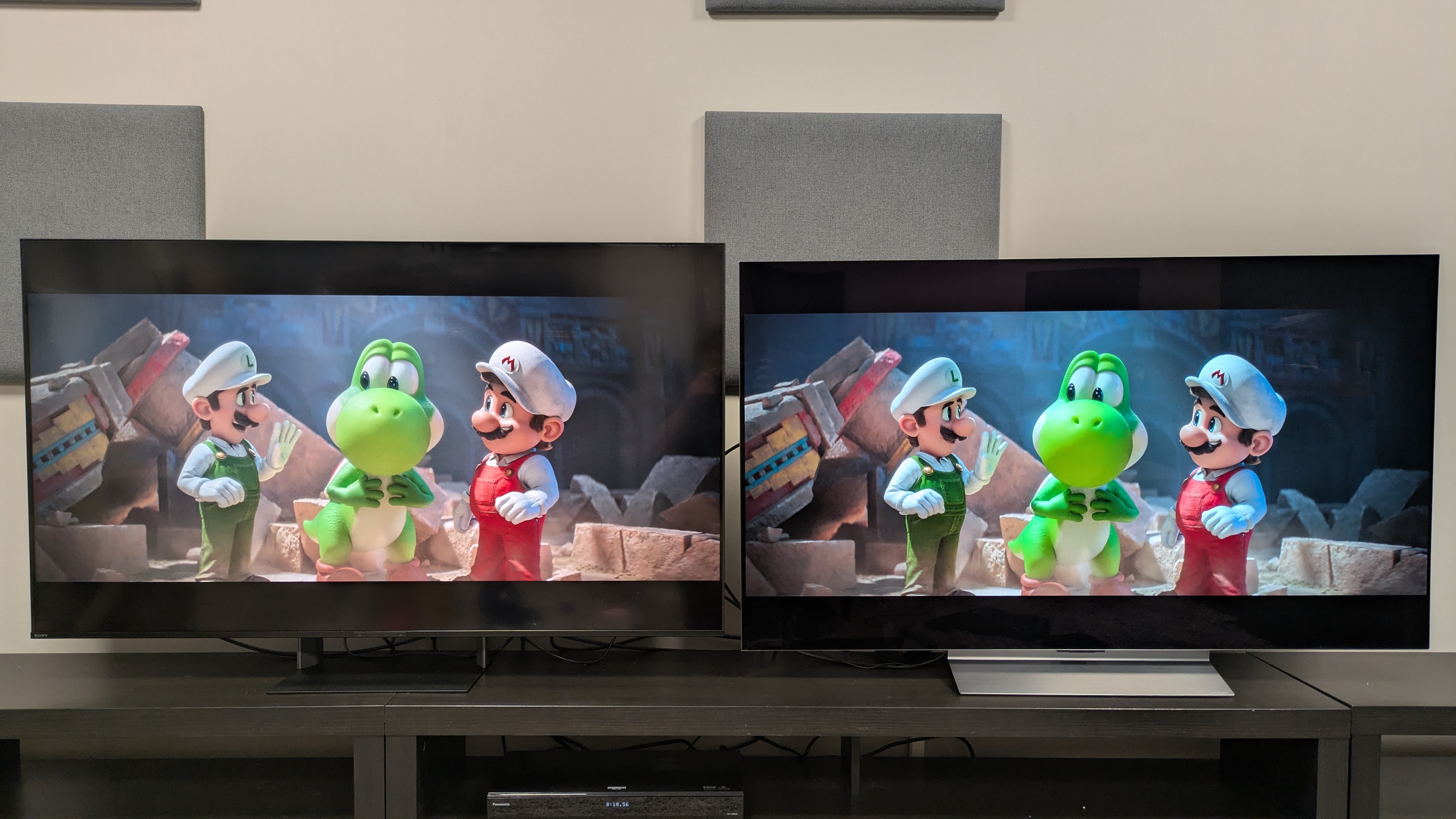 Sony Bravia 7 II (left) vs LG C6 (right) showing Luigi, Yoshi and Mario from the Super Mario Galaxy Movie. The C6's colors are bolder and deeper, while the Bravia 7 II's are brighter