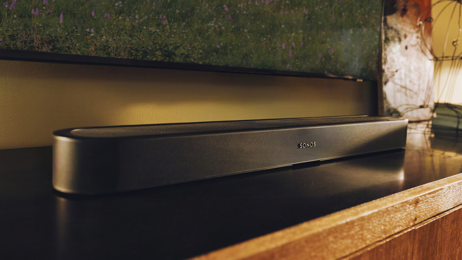 The Sonos Beam Ultra soundbar underneath a TV