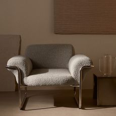 H&M HOME Lounge Chair in a minimalist living room