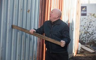 EastEnders Phil Mitchell bangs on a shipping container