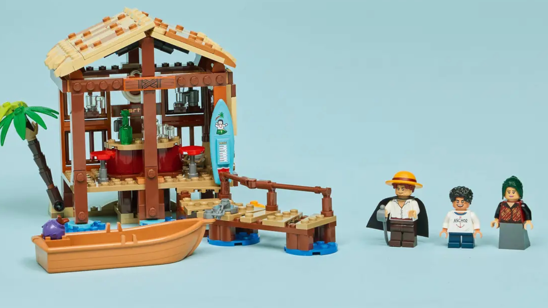 Three Lego minifigures standing beside a beach hut and boat, all against a blue background