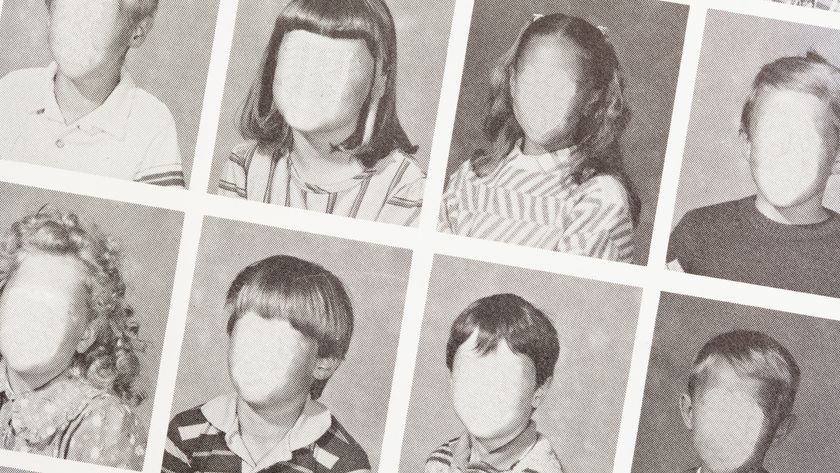A line of black and white school photos with the faces blank