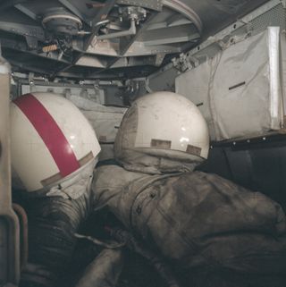 At the conclusion of Apollo 17’s mission in December 1972, moonwalking suits and space helmets are covered by lunar dust.