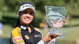 Jeeno Thitikul with the Walmart NW Arkansas Championship trophy